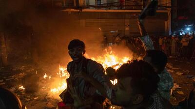 Protesters set fire outside the Prothom Alo office which had its windows smashed in Dhaka on Friday. (AFP) Protesters set fire outside the Prothom Alo office which had its windows smashed in Dhaka on Friday. (AFP)