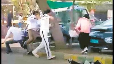The footage shows a group of students pelting bricks at a Mahindra Scorpio, while the driver is allegedly seen attempting to run over two students outside the university’s law department. (File) The footage shows a group of students pelting bricks at a Mahindra Scorpio, while the driver is allegedly seen attempting to run over two students outside the university’s law department. (File)