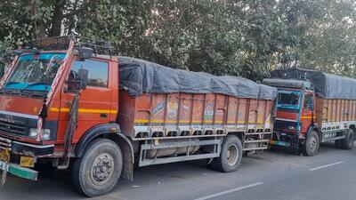 Truck remain parked in Udyog Vihar due to entry restrictions in New Delhi on Friday. (Parveen Kumar/HT Photo)