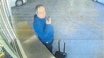 Claudio Neves Valente, suspect in the Brown University shooting in Providence, Rhode Island, picks up a vehicle at an Alamo Rent a Car in this frame grab from CCTV released in an affidavit by the Providence Police December 18, 2025. (via REUTERS)