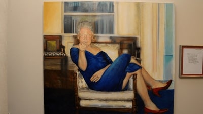 A painting of former US President Bill Clinton wearing a dress is displayed inside the Manhattan home of Jeffrey Epstein in this image from the estate of late financier and convicted sex offender Jeffrey Epstein, released by the Department of Justice in Washington, D.C. (Reuters)