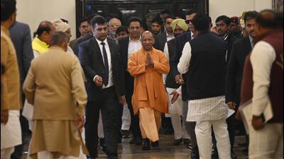 Uttar Pradesh chief minister Yogi Adityanath on his way to attend the winter session of the UP assembly in Lucknow on Friday. (Deepak Gupta/HT)