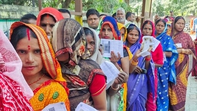 File photo of women voters waiting in a queue to cast their vote. (File Photo) File photo of women voters waiting in a queue to cast their vote. (File Photo)