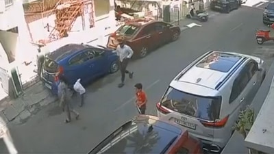 CCTV footage of the incident shows the accused 35-year-old walking out of the gate of his residence and towards the boy. (Video Screengrab) CCTV footage of the incident shows the accused 35-year-old walking out of the gate of his residence and towards the boy. (Video Screengrab)