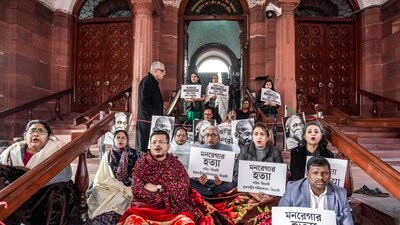 TMC MPs, including Dola Sen, Satabdi Roy, Derek O'Brien and Sagarika Ghose, staged a protest dharna against the passage of the VB-G RAM G bill. (PTI) TMC MPs, including Dola Sen, Satabdi Roy, Derek O'Brien and Sagarika Ghose, staged a protest dharna against the passage of the VB-G RAM G bill. (PTI)
