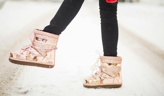 Snow boots keep feet warm, dry and stable - perfect for winter walks, travel and snowy adventures. (Pexels)