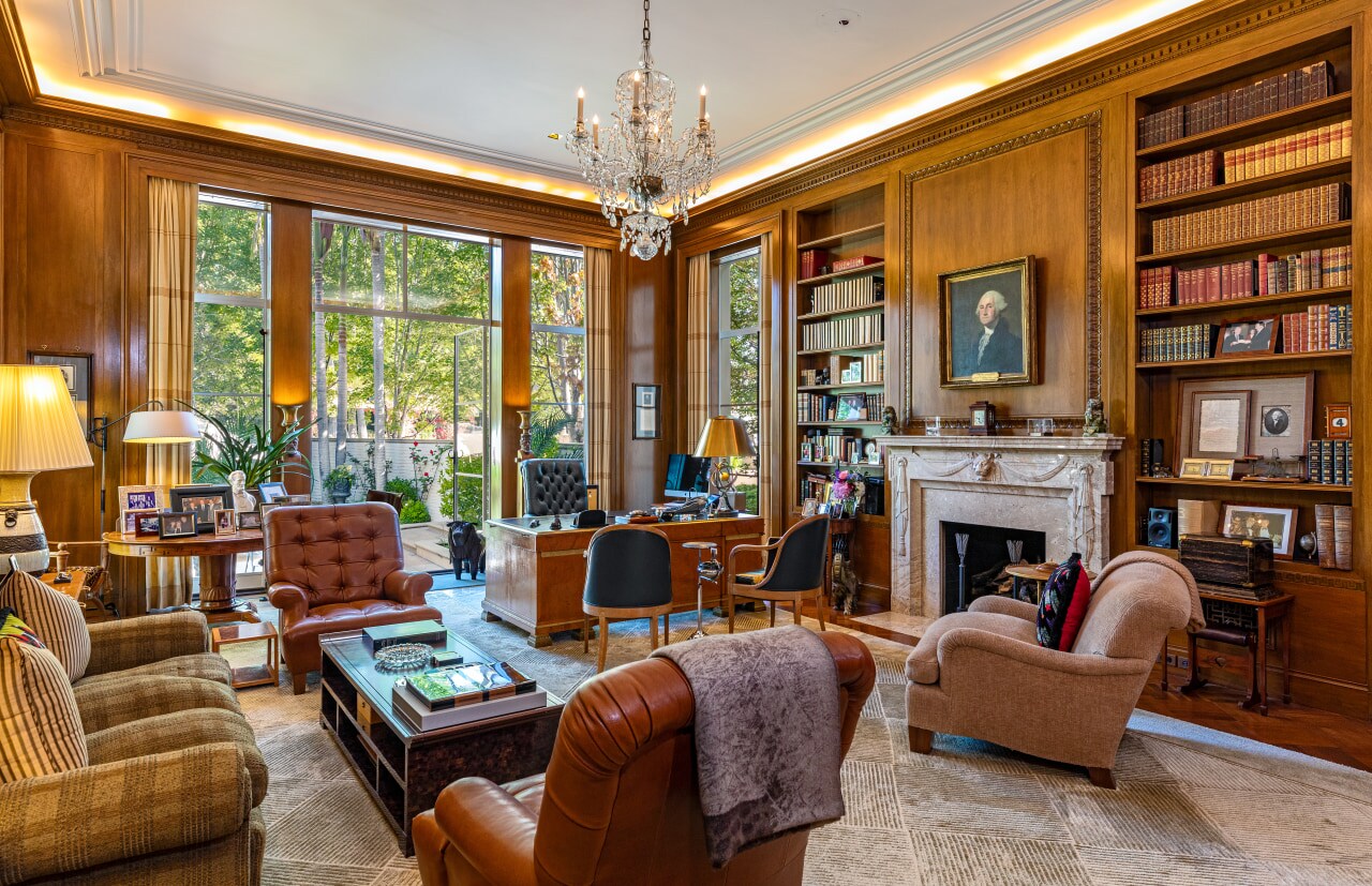 The seven-bedroom estate spans about 40,000 square feet and includes a wood-paneled library and office. The seven-bedroom estate spans about 40,000 square feet and includes a wood-paneled library and office.