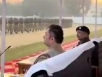 A screengrab of the video of the event where the preacher was purportedly given the guard of honour. (Sourced)
