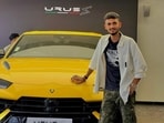 Anurag Dwivedi posing with his Lamborghini Urus S.