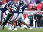 Trinidad Chambliss #6 of the Ole Miss Rebels makes a pass during the second quarter of the 2025 College Football Playoff First Round Game against the Tulane Green Wave at Vaught-Hemingway Stadium.