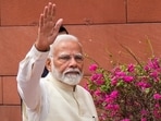 Prime Minister Narendra Modi waves as he arrives at the Parliament House complex. Prime Minister Narendra Modi waves as he arrives at the Parliament House complex.