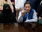 Pakistan's former Prime Minister Imran Khan, right, and his wife Bushra Bibi. Pakistan's former Prime Minister Imran Khan, right, and his wife Bushra Bibi.