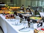 A wedding buffet offers a lot of options, making people overeat and then struggle with bloating. A wedding buffet offers a lot of options, making people overeat and then struggle with bloating.