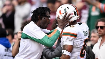 Former Miami Hurricanes player Michael Irvin celebrates with Miami Hurricanes defensive back Jakobe Thomas (IMAGN IMAGES via Reuters Connect)