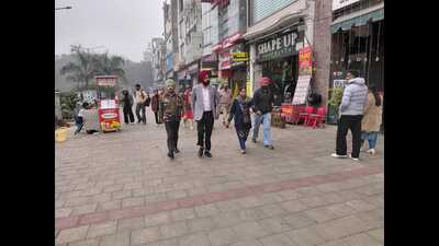 Officials during anti-begging drive at Kipps Market in Sarabha Nagar, Ludhiana, on Saturday. (HT Photo) Officials during anti-begging drive at Kipps Market in Sarabha Nagar, Ludhiana, on Saturday. (HT Photo)