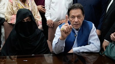 Pakistan's former Prime Minister Imran Khan, right, and his wife Bushra Bibi. (AP) Pakistan's former Prime Minister Imran Khan, right, and his wife Bushra Bibi. (AP)