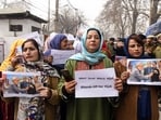 People’s Democratic Party (PDP) supporters stage a protest against the incident in which Bihar Chief Minister Nitish Kumar allegedly pulled a woman’s hijab during an event, outside the party headquarters in Srinagar on Friday. 
