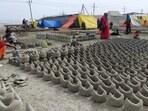 Boatmen busy with repairs ahead of Magh Mela, set to begin on January 3 at the Triveni Sangam in Prayagraj (HT) Boatmen busy with repairs ahead of Magh Mela, set to begin on January 3 at the Triveni Sangam in Prayagraj (HT)