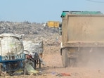 In 2018, when the Authority started dumping the waste at a vacant plot owned by it, villagers opposed the site stating that the plot was close to Hindon river, and it would cause river pollution, and also health issues to them. They were assured it was a temporary site, and would be shifted to Astoli village in Greater Noida. (Sunil Ghosh/HT Photo)