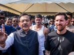 Argentine footballer Lionel Messi with West Bengal Sports Minister Aroop Biswas during an event as part of his 'G.O.A.T. India Tour 2025' in Kolkata on December 13.