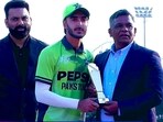 Sameer Minhas with the player of the tournament trophy.