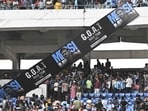 Fans react as Inter Miami's Argentine forward #10 Lionel Messi departs from the Salt Lake Stadium in Kolkata on December 13, 2025. Thousands of fans packed into a stadium in eastern India on December 13 to cheer on Lionel Messi as the football legend unveiled a 21-metre (70-foot) statue of himself.