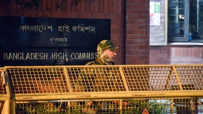 A security official stands guard outside the Bangladesh High Commission following protests in Bangladesh after the death of leader Sharif Osman Hadi, in New Delhi (ANI) A security official stands guard outside the Bangladesh High Commission following protests in Bangladesh after the death of leader Sharif Osman Hadi, in New Delhi (ANI)