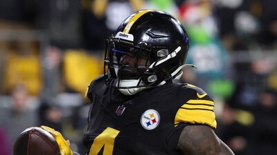 Pittsburgh Steelers wide receiver DK Metcalf scores a touchdown against the Miami Dolphins on Dec 15. (IMAGN IMAGES via Reuters Connect)
