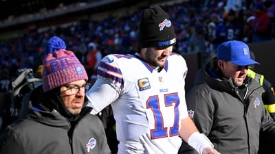 Buffalo Bills quarterback Josh Allen (17) leaves the field after an injury against the Cleveland Browns (AP) Buffalo Bills quarterback Josh Allen (17) leaves the field after an injury against the Cleveland Browns (AP)