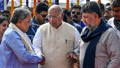 Karnataka CM Siddaramaiah, state Deputy CM DK Shivakumar and Congress President Mallikarjun Kharge during an event marking BR Ambedkar's 69th death anniversary, observed as 'Mahaparinirvan Diwas', in Bengaluru. (PTI) Karnataka CM Siddaramaiah, state Deputy CM DK Shivakumar and Congress President Mallikarjun Kharge during an event marking BR Ambedkar's 69th death anniversary, observed as 'Mahaparinirvan Diwas', in Bengaluru. (PTI)