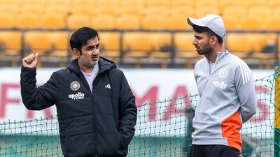 Gautam Gambhir and Jitesh Sharma during a training session ahead of the third T20I. (PTI)
