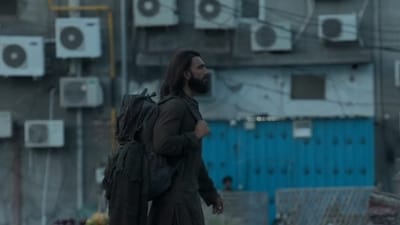 Dhurandhar box office collection day 17: Ranveer Singh's character walking in Lyari in a still from the film. Dhurandhar box office collection day 17: Ranveer Singh's character walking in Lyari in a still from the film.