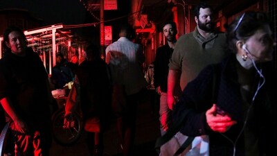 Pedestrians walk in the dark on Hayes Street after a major power outage in San Francisco on Saturday, Dec. 20, 2025. (Yalonda M. James/San Francisco Chronicle via AP) (AP) Pedestrians walk in the dark on Hayes Street after a major power outage in San Francisco on Saturday, Dec. 20, 2025. (Yalonda M. James/San Francisco Chronicle via AP) (AP)