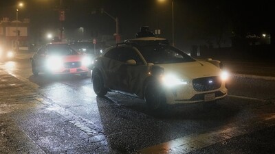 A Waymo vehicle sits idling at an intersection with no operating traffic lights due to power outages, in San Francisco, Saturday, Dec. 20, 2025. (AP Photo/Jeff Chiu) (AP) A Waymo vehicle sits idling at an intersection with no operating traffic lights due to power outages, in San Francisco, Saturday, Dec. 20, 2025. (AP Photo/Jeff Chiu) (AP)