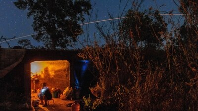 Thai resident cooks in a shelter while Thai military fires artillery towards Cambodia, Saturday, Dec. 20, 2025, in Surin province, Thailand. (AP) Thai resident cooks in a shelter while Thai military fires artillery towards Cambodia, Saturday, Dec. 20, 2025, in Surin province, Thailand. (AP)