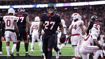 Woody Marks #27 of the Houston Texans celebrates a touchdown against the Arizona Cardinals (Getty Images via AFP)