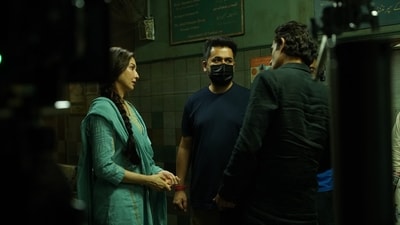 Saumya Tandon with director Aditya Dhar and co-star Akshaye Khanna on the set of Dhurandhar. Saumya Tandon with director Aditya Dhar and co-star Akshaye Khanna on the set of Dhurandhar.