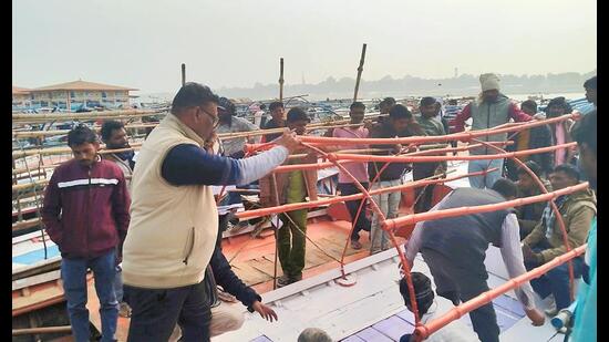 Inspection of boats underway on the banks of Sangam in Prayagraj. (HT)