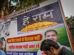 A poster opposing the renaming of the MGNREGA scheme at Raisina Road in New Delhi. (HT Photo/Sanchit Khanna)