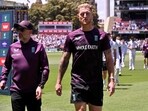 England captain Ben Stokes leads his players from the field. 