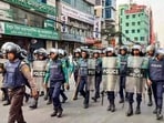 Security personnel in Dhaka after unrest grew in Bangladesh,