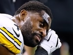 Pittsburgh Steelers' DK Metcalf wipes his face on the bench during the second half of an NFL football game against the Detroit Lions. Pittsburgh Steelers' DK Metcalf wipes his face on the bench during the second half of an NFL football game against the Detroit Lions.
