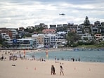  A police helicopter patrols over the Bondi Beach a week after the the shooting attack in Sydney.