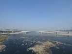 Water quality testing involves collecting samples from eight locations along the Yamuna’s course through Delhi. (Arvind Yadav/HT Photo)