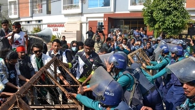 Bangladeshi police try to stop demonstrators as they march towards the assistant Indian high commissioner office in Rajshahi. (AFP) Bangladeshi police try to stop demonstrators as they march towards the assistant Indian high commissioner office in Rajshahi. (AFP)