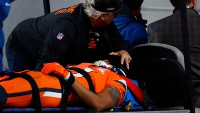 Pat Bryant #13 of the Denver Broncos is carted off the field during the fourth quarter against the Jacksonville Jaguars at Empower Field Sunday. (Getty Images via AFP) Pat Bryant #13 of the Denver Broncos is carted off the field during the fourth quarter against the Jacksonville Jaguars at Empower Field Sunday. (Getty Images via AFP)
