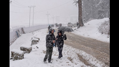 People during a fresh spell of snowfall, in Gulmarg on Monday. (ANI) People during a fresh spell of snowfall, in Gulmarg on Monday. (ANI)