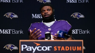 Back injury forces Lamar Jackson out of Sunday night matchup against Patriots (AP) Back injury forces Lamar Jackson out of Sunday night matchup against Patriots (AP)