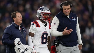 Stefon Diggs #8 of the New England Patriots walks off of the field during the first quarter against the Baltimore Ravens (Getty Images via AFP)