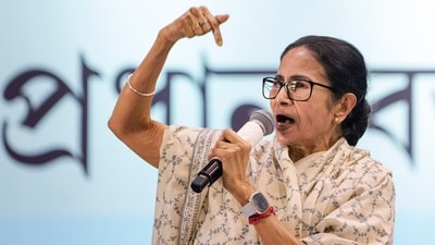 West Bengal chief minister and TMC supremo Mamata Banerjee addresses the party's booth level agents (BLAs) during a meeting, in Kolkata, Monday (PTI)
